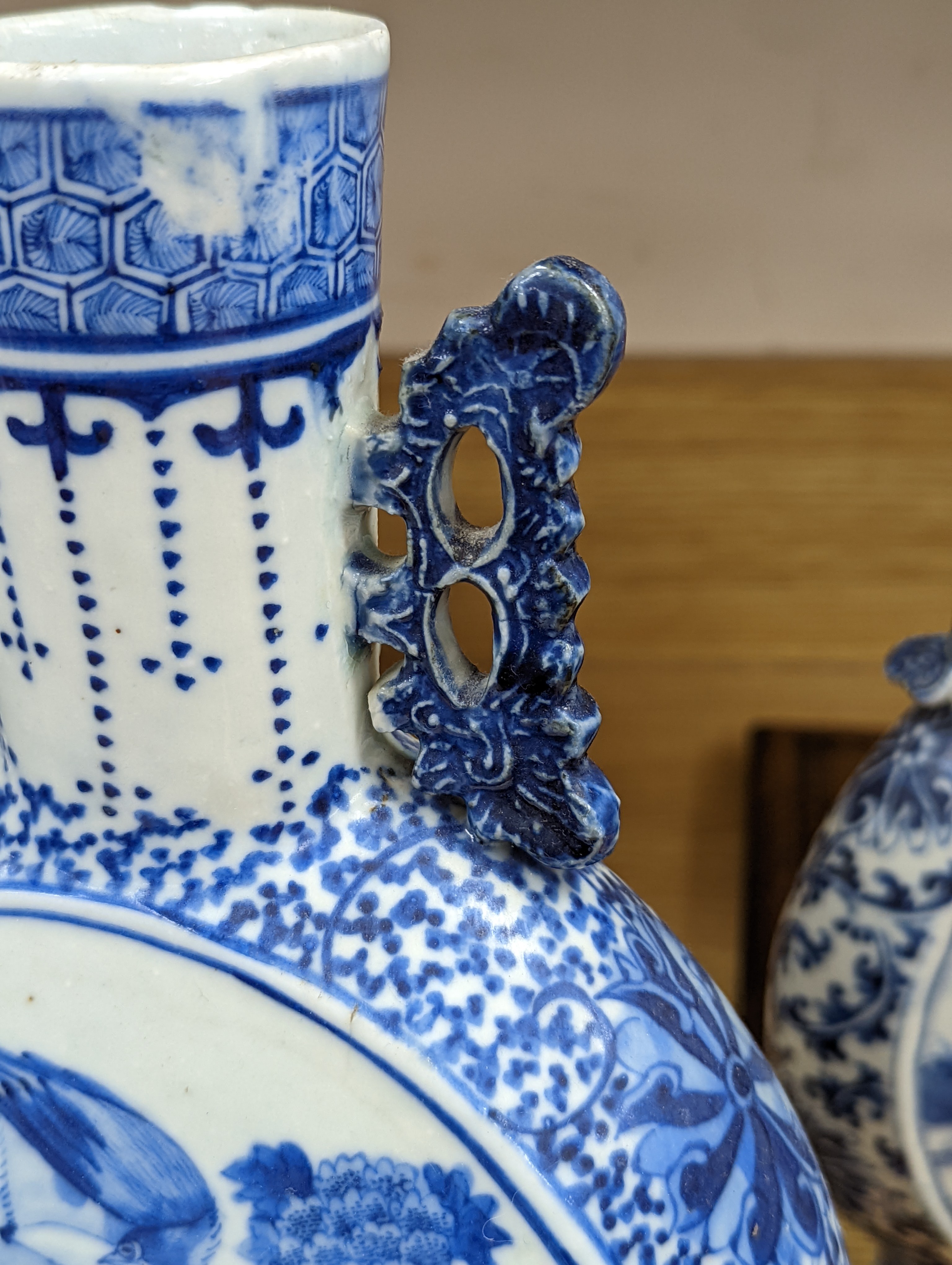 Three 19th century Chinese blue and white Moon flasks, tallest 31 cms.